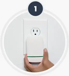 Esaver Watt being plugged into a wall